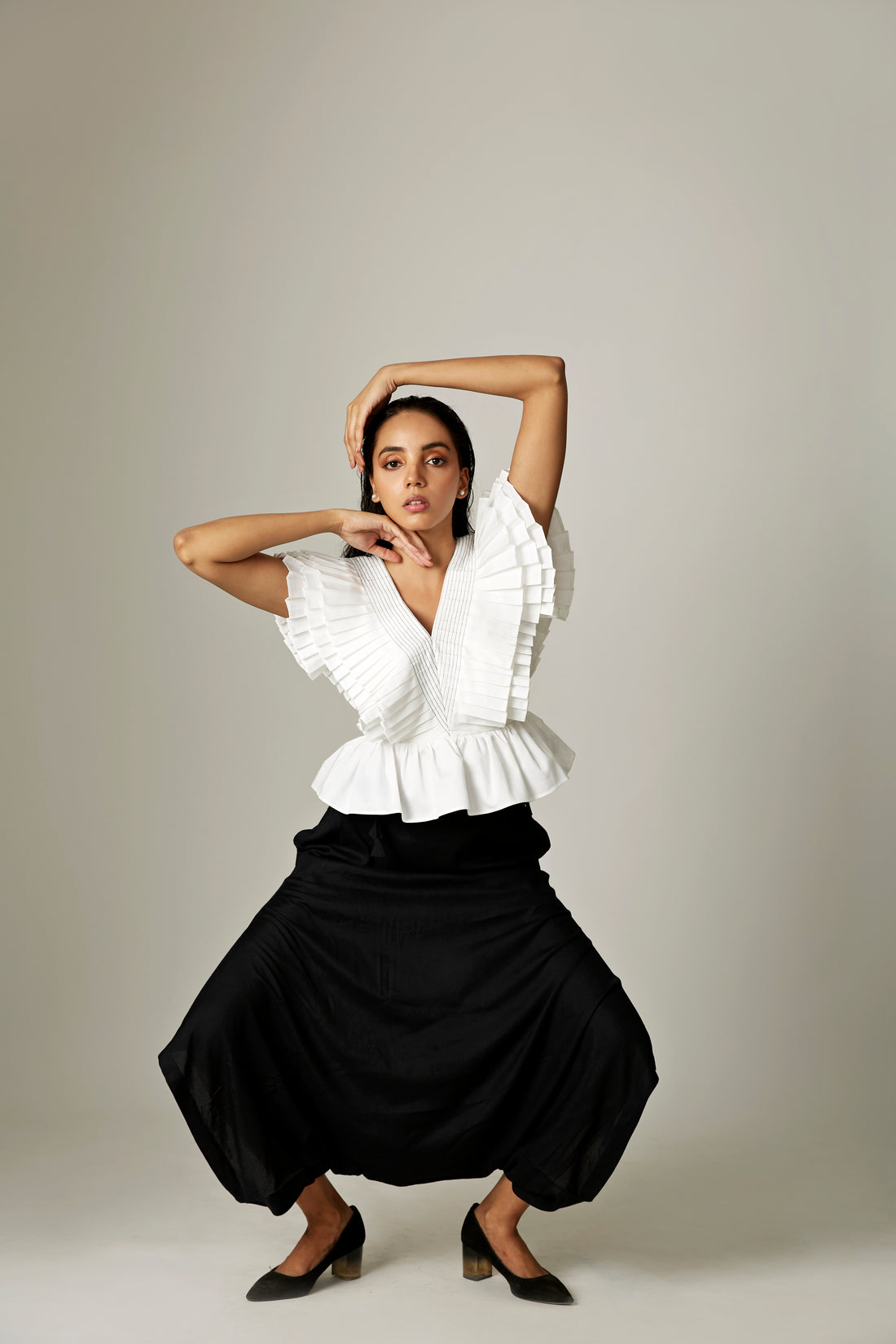 Pleated Drama Peplum